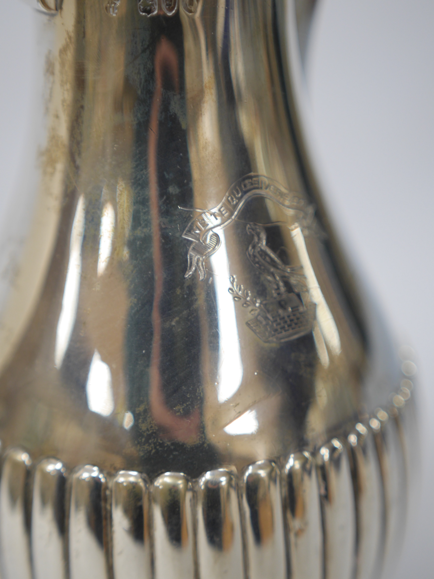 A Victorian demi-fluted silver hot water pot by Charles Stuart Harris, London, 1891, 22.3cm, gross weight 13.4oz. Condition - fair
